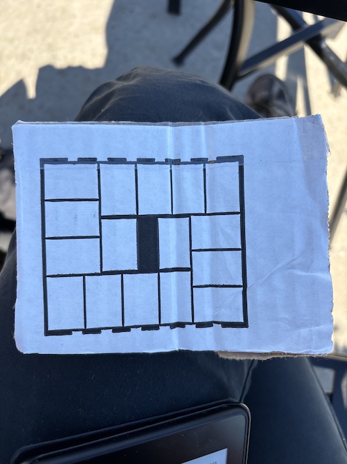 cryptic image on a piece of cardboard