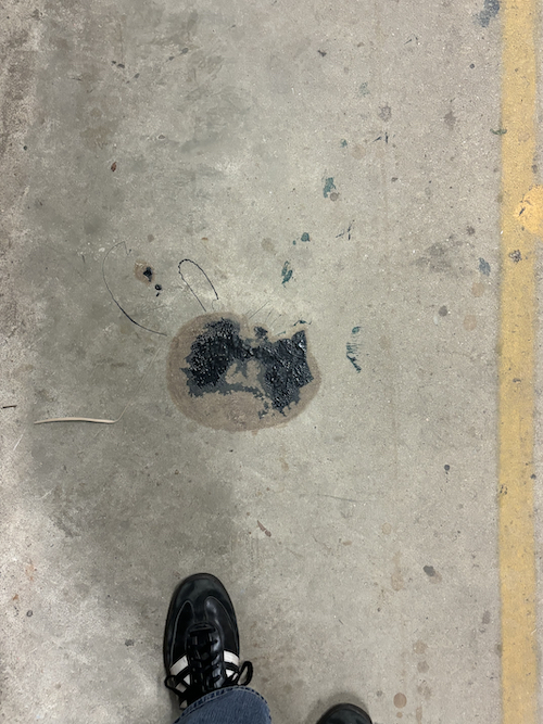 mess on the floor in the shape of an angel