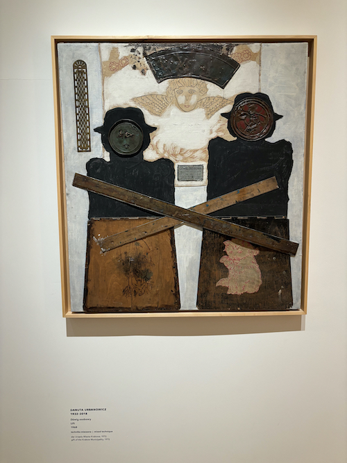 artwork arms crossed over each other and an angel