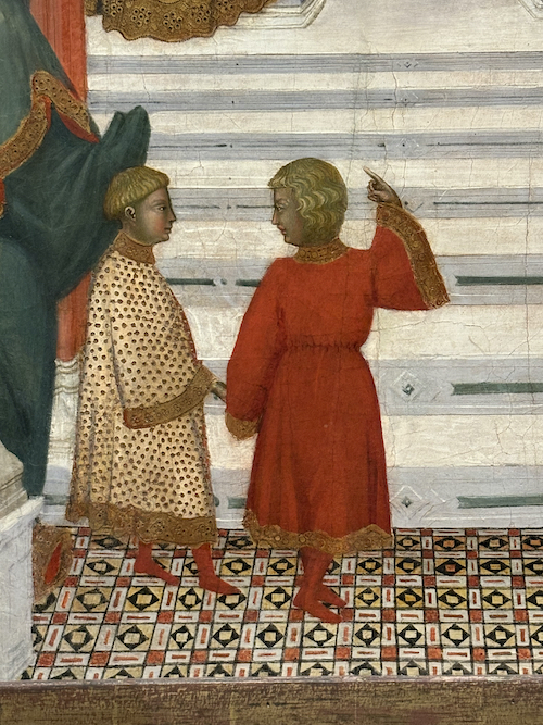 two child angels pointing