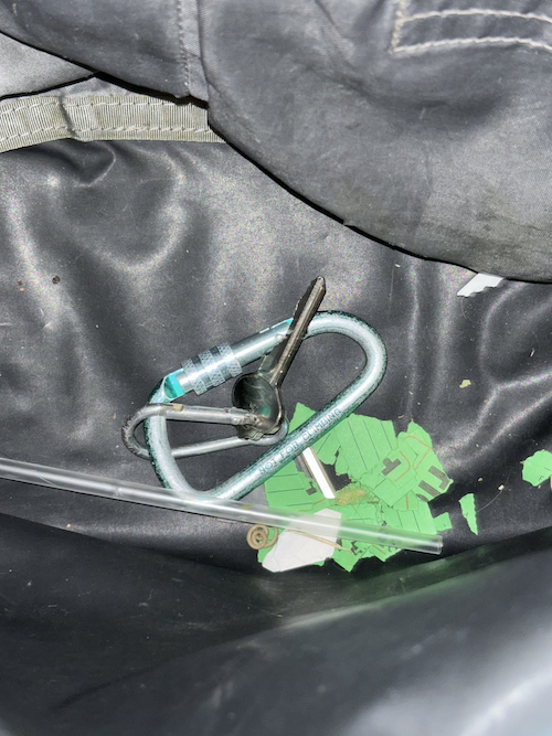 torn up raffle ticket in cy's bag